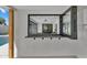 Outdoor pass through with granite bar top into updated home with pool and outdoor space at 8215 E Virginia Ave, Scottsdale, AZ 85257
