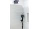 Modern shower features square rainfall shower head, handheld sprayer, and recessed niche at 8215 E Virginia Ave, Scottsdale, AZ 85257