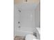Clean bathroom featuring subway tile shower/tub with modern fixtures at 1112 W Farmdale Ave, Mesa, AZ 85210