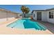 Sparkling pool surrounded by desert landscaping and shaded seating areas at 1112 W Farmdale Ave, Mesa, AZ 85210