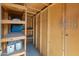 Wooden storage shed with shelves and other storage solutions at 1112 W Farmdale Ave, Mesa, AZ 85210