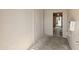 Small storage area featuring painted brick walls and a small air conditioner at 1112 W Farmdale Ave, Mesa, AZ 85210