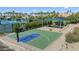 Multi-purpose basketball and recreational court for tennis, pickleball, and basketball in active adult community at 11224 E Carol Ave, Scottsdale, AZ 85259