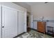 room featuring a dinosaur-themed rug, closet doors, a chest of drawers and neutral decor at 11224 E Carol Ave, Scottsdale, AZ 85259