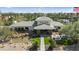 Beautiful, light and bright clubhouse with well-manicured grounds and peaceful water feature in an active adult community at 11224 E Carol Ave, Scottsdale, AZ 85259