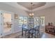 Bright dining area with views of the backyard and easy access to outdoor dining at 11224 E Carol Ave, Scottsdale, AZ 85259
