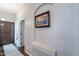 Hallway featuring built-in cabinets and a niche displaying artwork for an elegant touch at 11224 E Carol Ave, Scottsdale, AZ 85259
