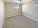 Cozy bedroom with carpet flooring, neutral walls, and great natural light at 11663 W Luxton Ln, Avondale, AZ 85323