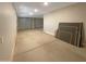 Spacious garage with multiple garage doors and ample storage space at 11663 W Luxton Ln, Avondale, AZ 85323