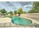 Inviting pool area with lush landscaping and space for outdoor enjoyment at 15454 W Evans Dr, Surprise, AZ 85379