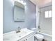 Neat bathroom featuring a single sink vanity, framed mirror, and tub shower combo at 1556 E Dover Cir, Mesa, AZ 85203