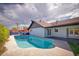 Inviting backyard pool with a spacious patio area, perfect for outdoor entertaining at 1556 E Dover Cir, Mesa, AZ 85203