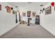 Spacious bonus room with carpeting and sports-themed decor at 15814 N 62Nd Cir, Glendale, AZ 85306