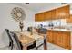 Inviting dining area with stylish decor and ample seating for gatherings at 15814 N 62Nd Cir, Glendale, AZ 85306