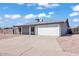 Charming single-level home featuring a two-car garage and low-maintenance desert landscaping at 15814 N 62Nd Cir, Glendale, AZ 85306