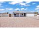Single-level home featuring desert landscaping, providing an inviting and low-maintenance exterior at 15814 N 62Nd Cir, Glendale, AZ 85306