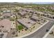 An aerial view of the property highlighting the pool and artificial turf at 18120 W Cassia Way, Goodyear, AZ 85338
