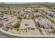 An aerial view of the property highlighting the pool and artificial turf at 18120 W Cassia Way, Goodyear, AZ 85338