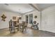 Elegant dining room featuring a wood tile floor and a decorative chandelier at 18120 W Cassia Way, Goodyear, AZ 85338