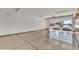 Bright garage with a view to the outside, featuring a storage unit running along the right side of the image at 18120 W Cassia Way, Goodyear, AZ 85338