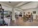 Open-concept space with living room, dining area, and kitchen, perfect for entertaining at 18120 W Cassia Way, Goodyear, AZ 85338