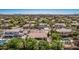 Aerial view of home showing mature trees and lush landscapes in a great neighborhood at 1834 E Scorpio Pl, Chandler, AZ 85249