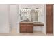 Bathroom vanity with cabinets and granite countertops at 1834 E Scorpio Pl, Chandler, AZ 85249