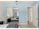 This bedroom features a closet with mirrored doors and entry to the hallway at 1834 E Scorpio Pl, Chandler, AZ 85249