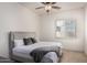 Bedroom with ceiling fan and window with shutters at 1834 E Scorpio Pl, Chandler, AZ 85249