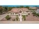 Beautiful home featuring desert landscaping, a tiled roof, stone accents and a grand entrance at 1834 E Scorpio Pl, Chandler, AZ 85249