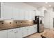 Kitchen featuring stainless steel refrigerator and granite countertops at 1834 E Scorpio Pl, Chandler, AZ 85249