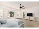 Spacious main bedroom with neutral color palette, shutters, and a ceiling fan at 1834 E Scorpio Pl, Chandler, AZ 85249