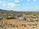 Extensive land parcel with mountain views near several residential properties at 20041 W Pasadena Ave, Litchfield Park, AZ 85340