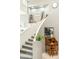 Elegant staircase with neutral tones, displaying decorative touches and leading to the upper level of the home at 20041 W Pasadena Ave, Litchfield Park, AZ 85340