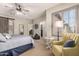 The large main bedroom is well-lit and features shutters on the windows at 21152 W Sunrise Ln, Buckeye, AZ 85396