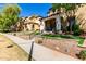 A well maintained street view showcases homes with lovely landscaping, inviting porches, and community appeal at 21152 W Sunrise Ln, Buckeye, AZ 85396