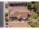 Aerial view showcases the architecture and landscaping of a home's backyard at 2116 E Beautiful Ln, Phoenix, AZ 85042