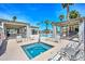 Community hot tub and lounge area with relaxing seating near the pool and spa at 2116 E Beautiful Ln, Phoenix, AZ 85042
