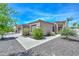 Single story home featuring a tile roof and low maintenance desert landscaping in front yard at 2116 E Beautiful Ln, Phoenix, AZ 85042
