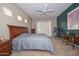 Bedroom with ceiling fan, recessed lighting, and sliding glass door access to the backyard at 2116 E Beautiful Ln, Phoenix, AZ 85042