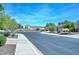 View of the neighborhood street and sidewalks, offering a glimpse of the community homes at 2116 E Beautiful Ln, Phoenix, AZ 85042