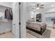 Cozy bedroom with a ceiling fan, window and closet at 21470 E Orchard Ln, Queen Creek, AZ 85142