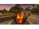 Cozy backyard fire pit area, ideal for gatherings, with pool in the background at 21470 E Orchard Ln, Queen Creek, AZ 85142