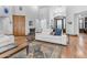 Open-concept living area with hardwood floors and ample seating at 21470 E Orchard Ln, Queen Creek, AZ 85142