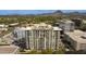 Multi-story condo building with balconies offering mountain views in a vibrant urban setting at 2211 E Camelback Rd # 402, Phoenix, AZ 85016
