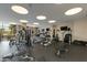 Spacious gym with modern exercise equipment. The gym is well-lit and has multiple machines at 2211 E Camelback Rd # 402, Phoenix, AZ 85016