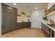 Well-designed kitchen with custom cabinets and modern appliances at 2211 E Camelback Rd # 402, Phoenix, AZ 85016