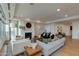 Spacious living room with fireplace and modern decor and furnishings at 2211 E Camelback Rd # 402, Phoenix, AZ 85016