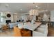 Open concept living area and dining room with modern furnishings at 2211 E Camelback Rd # 402, Phoenix, AZ 85016