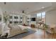 Spacious main bedroom with large windows and contemporary decor at 2211 E Camelback Rd # 402, Phoenix, AZ 85016